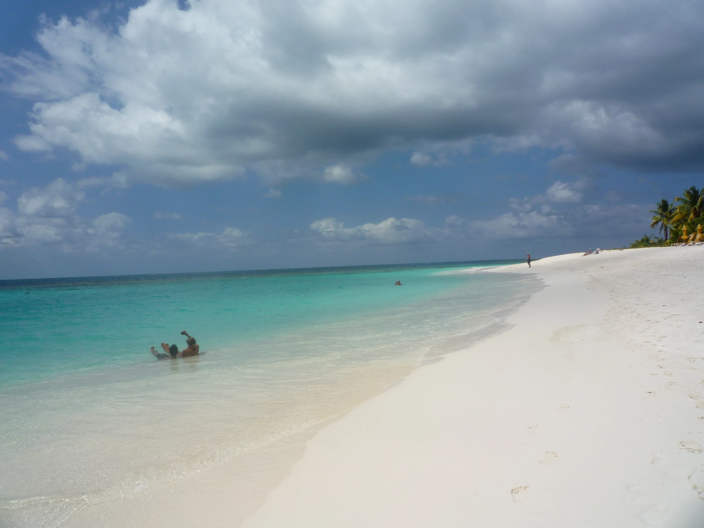 Pale sand and shallow-looking turquoise water at Shoal Bay, Anguilla