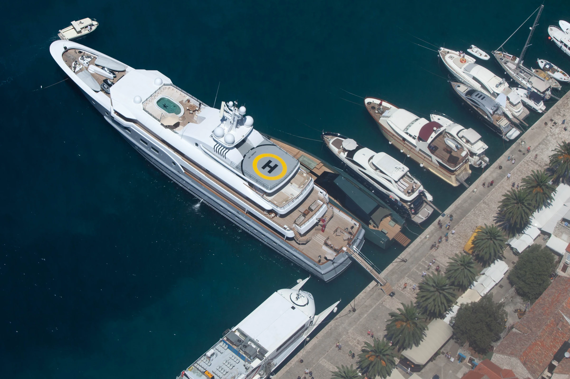 Several motor yachts alongside the town quay in Hvar harbour, Croatia