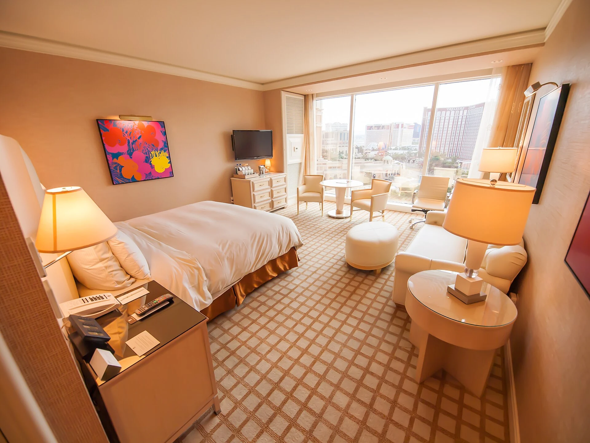 Real guest room at Wynn Las Vegas with bed, seating area and windows