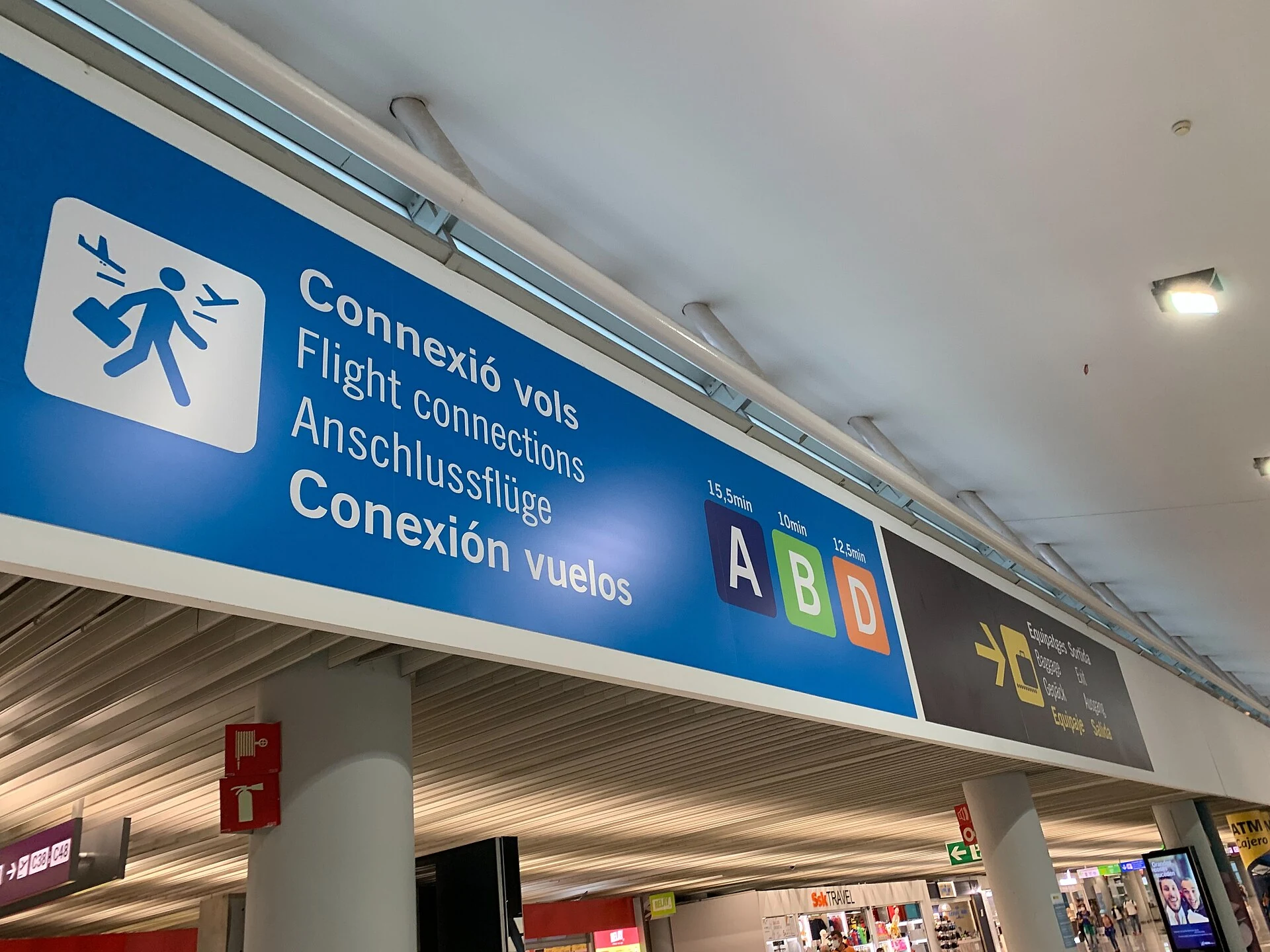 Multilingual flight-connections sign at Palma de Mallorca Airport