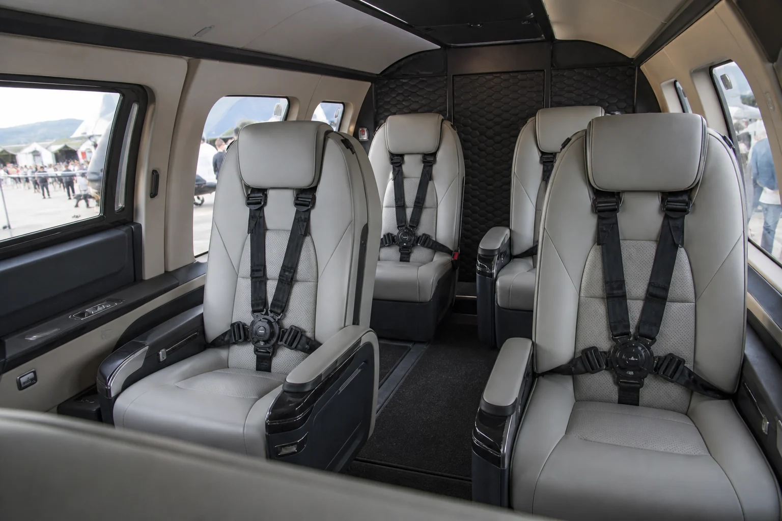 Real Airbus Corporate Helicopters cabin mock-up with individual seats and harnesses at EBACE 2019