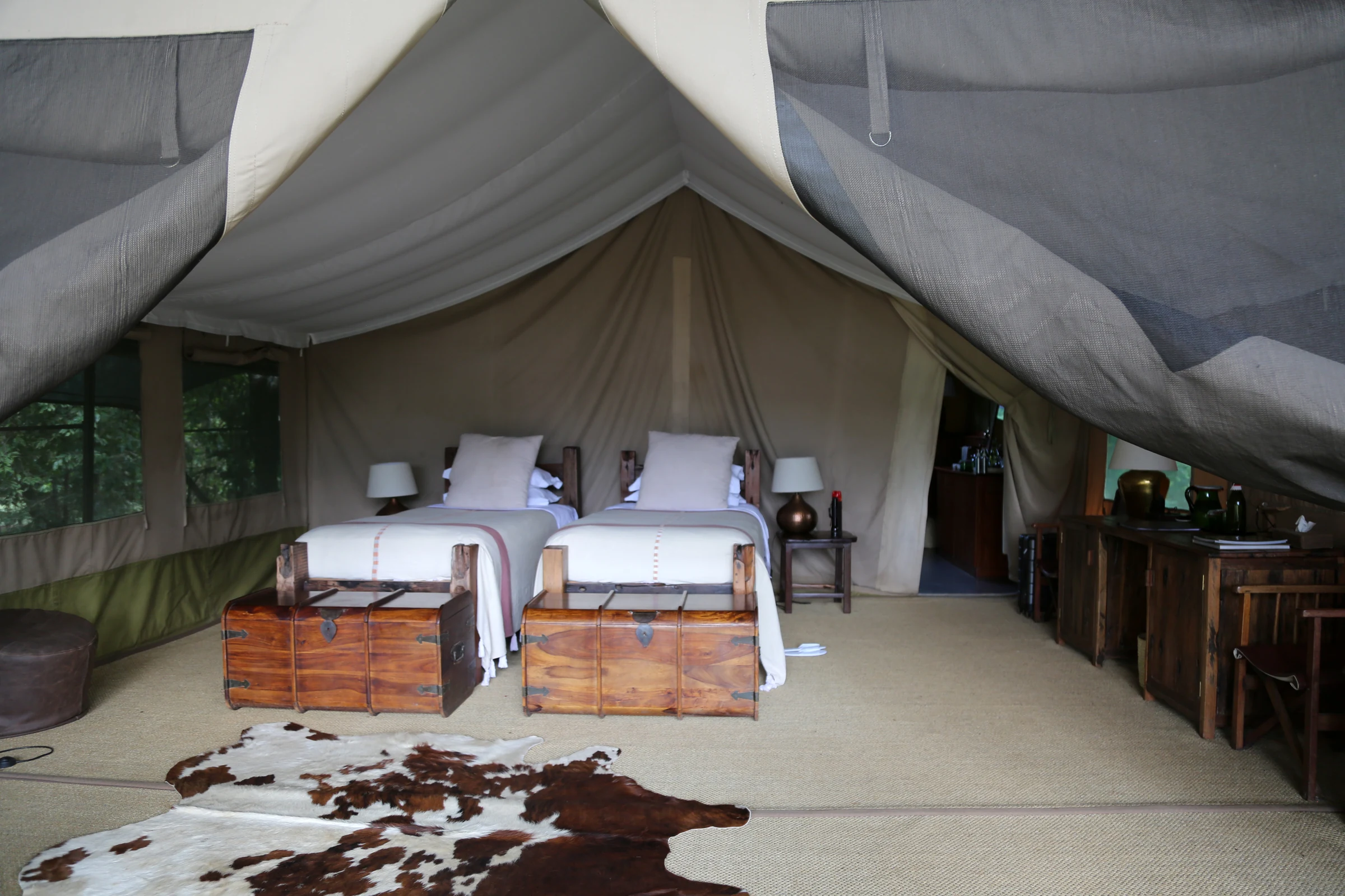 Interior of a spacious safari tent at Il Moran Camp in the Masai Mara