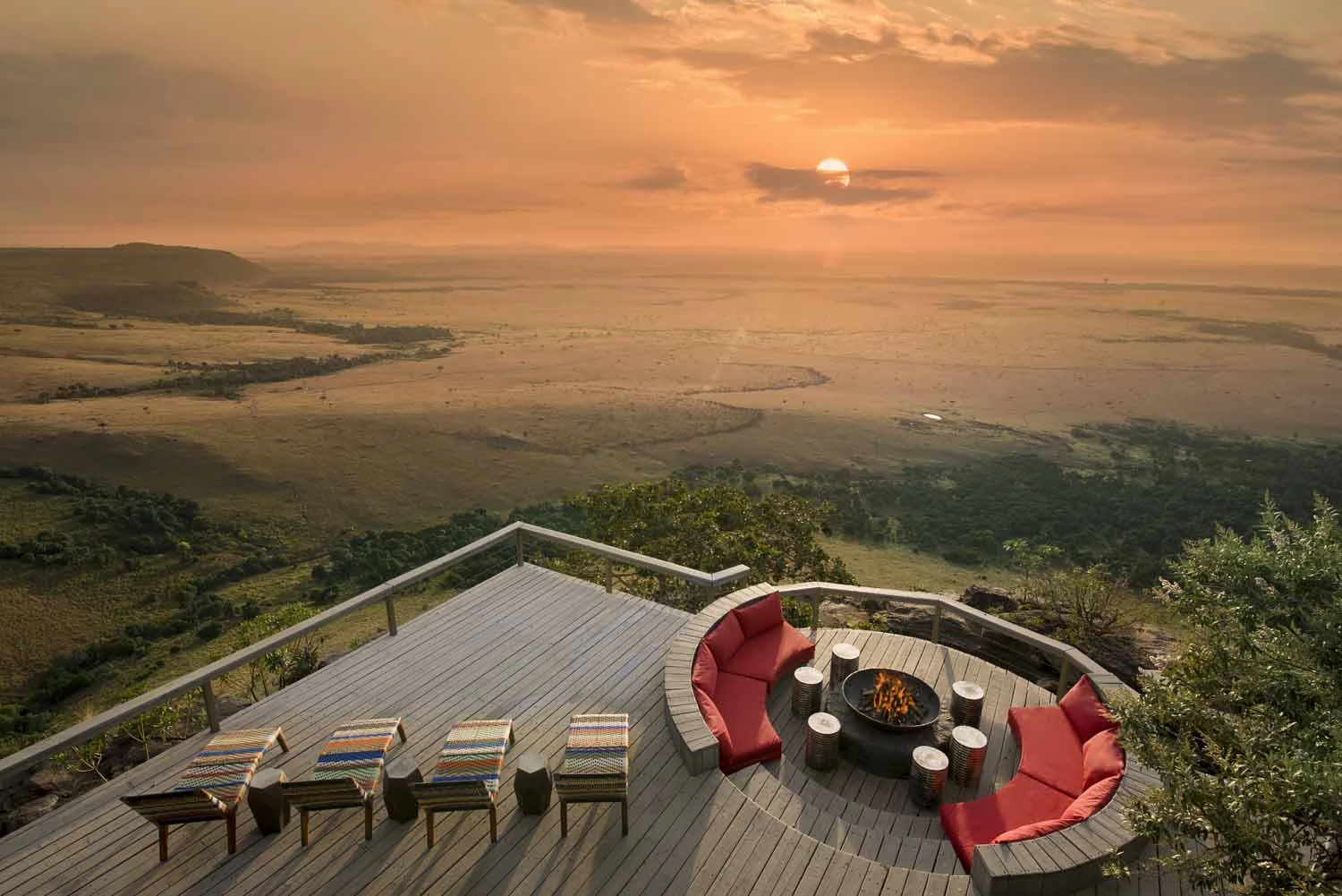 Angama Mara deck with firepit and a broad view across the Mara