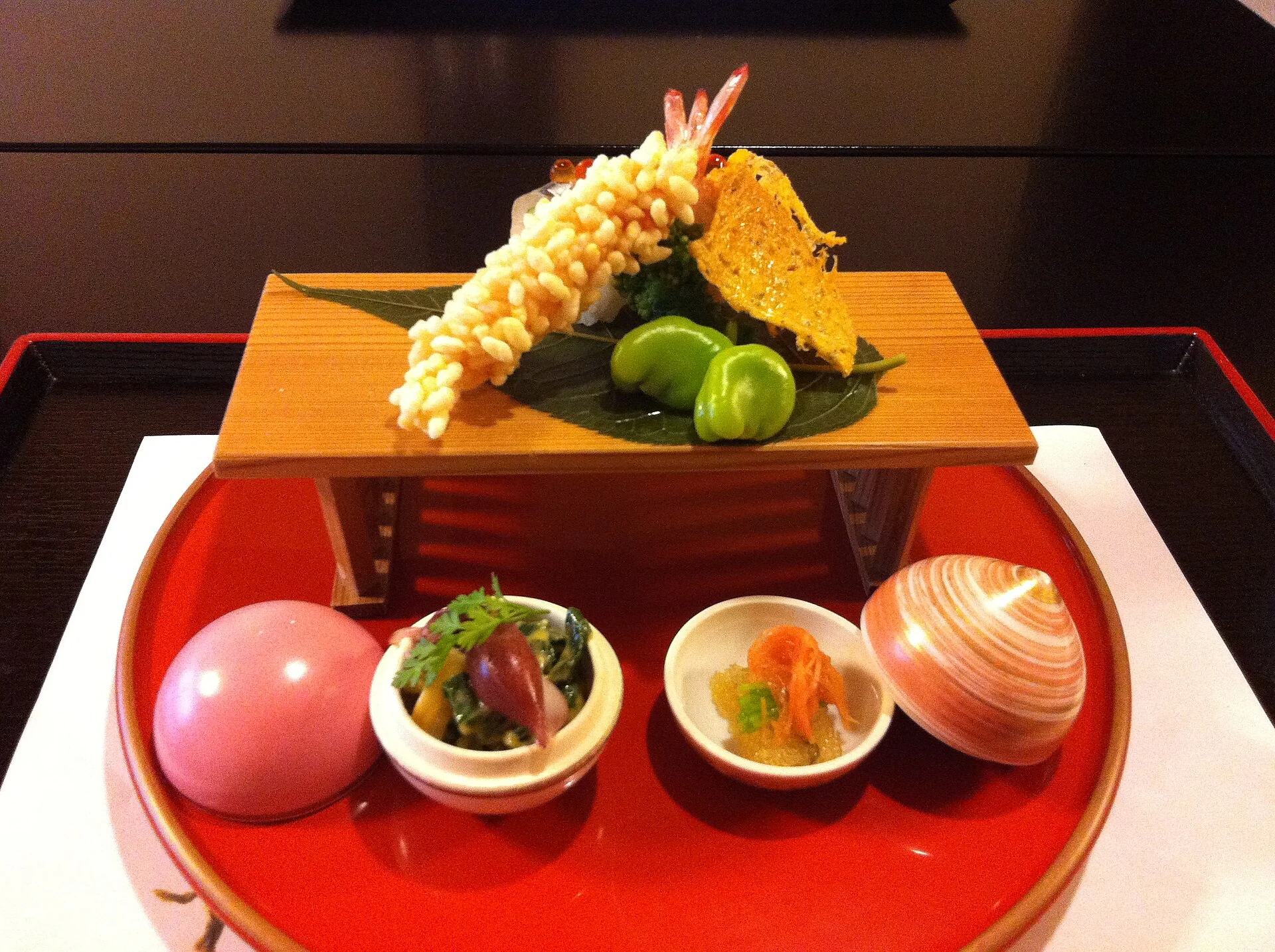 Kaiseki course in Kyoto arranged across several small vessels
