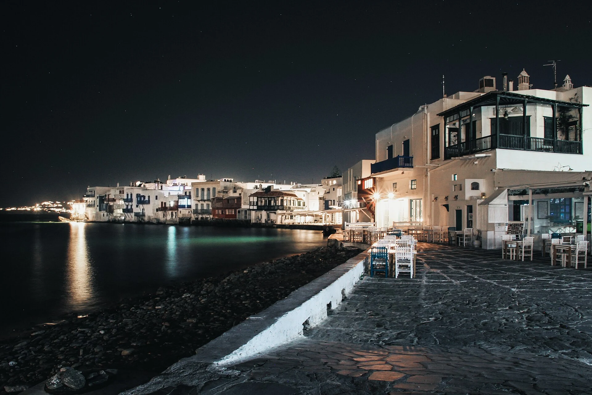 Real Little Venice in Chora at night with waterfront restaurants