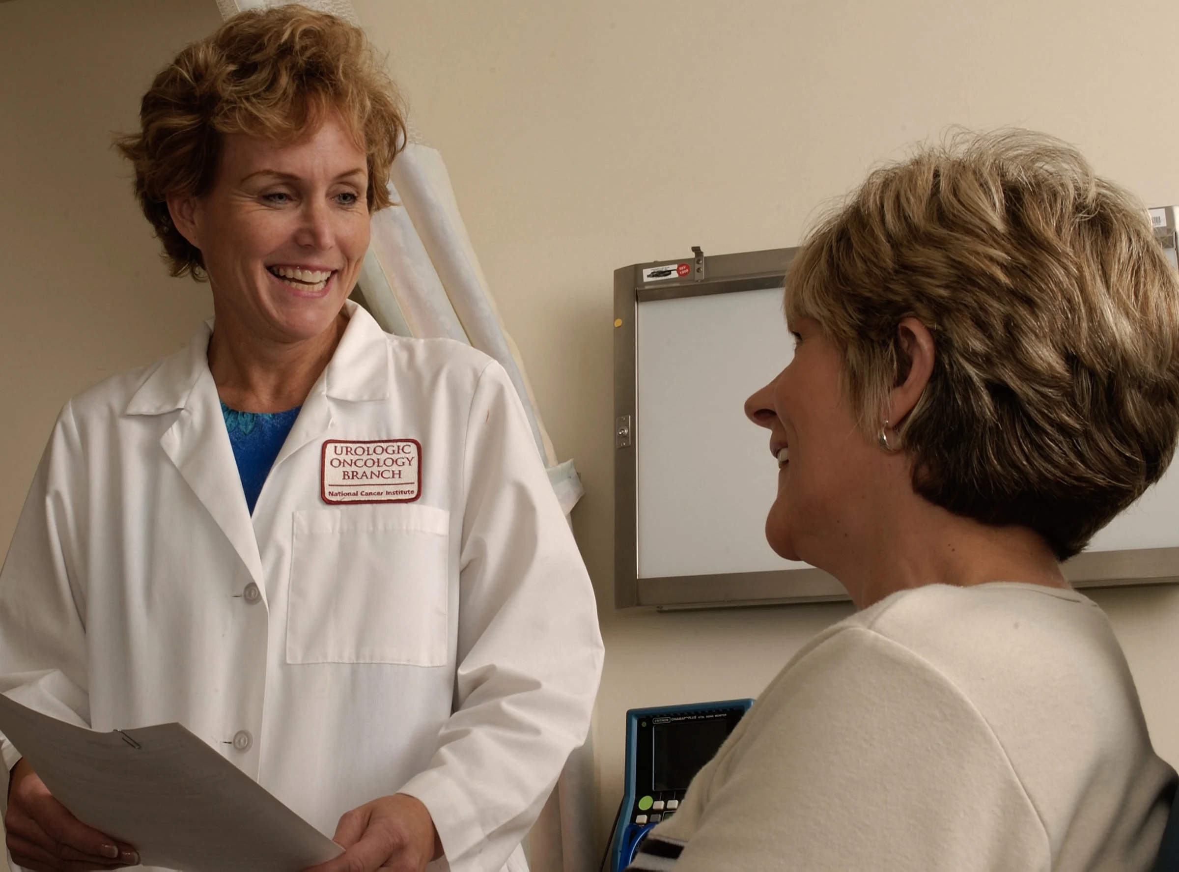 National Cancer Institute physician talking with a patient