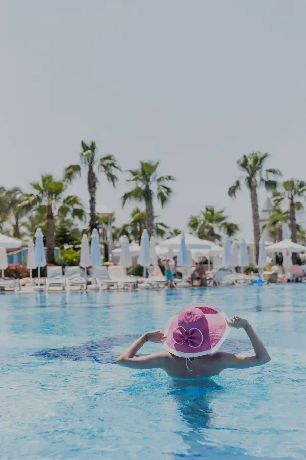 Relaxed stay at a luxury hotel pool